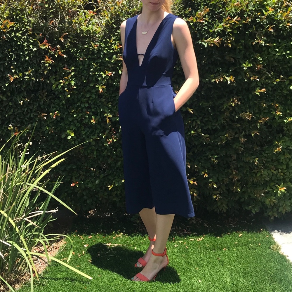 Adelyn Rae navy blue jumpsuit, low cut, worn once